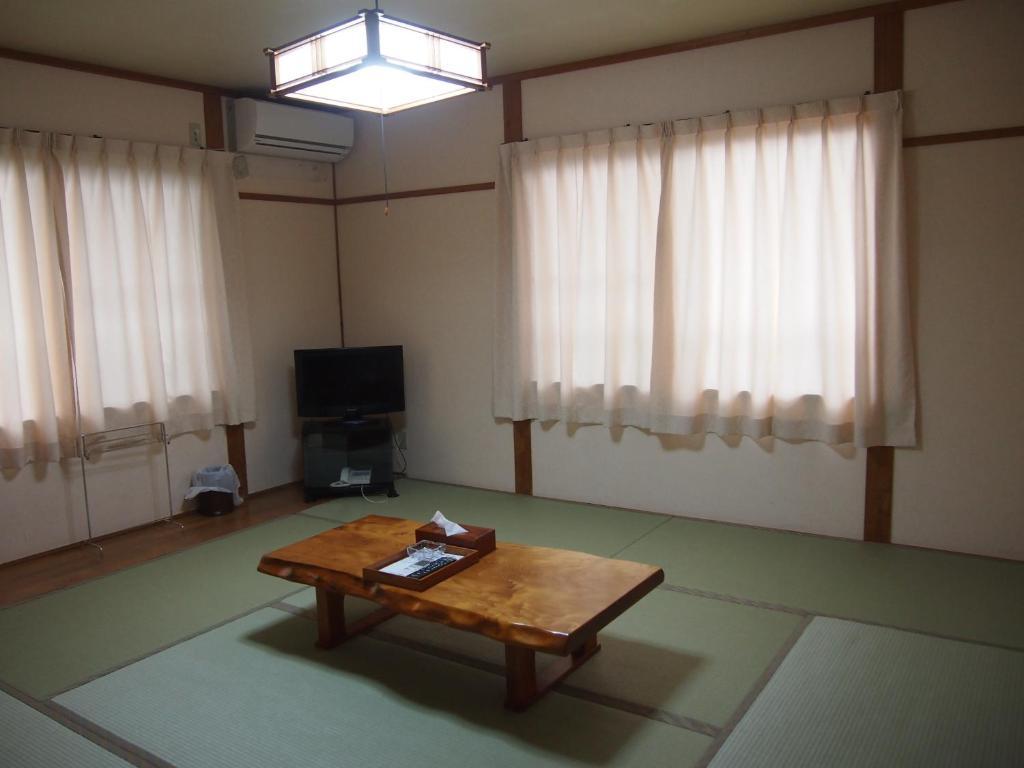 Готель Minshuku Yakusugi-Sou Якусіма Номер фото